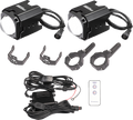 The image shows a motorcycle LED fog light kit, including two black rectangular lights with attached cables, two metal mounting brackets, two circular mounting clamps, a wiring harness with connectors, a control box, and a small remote control.