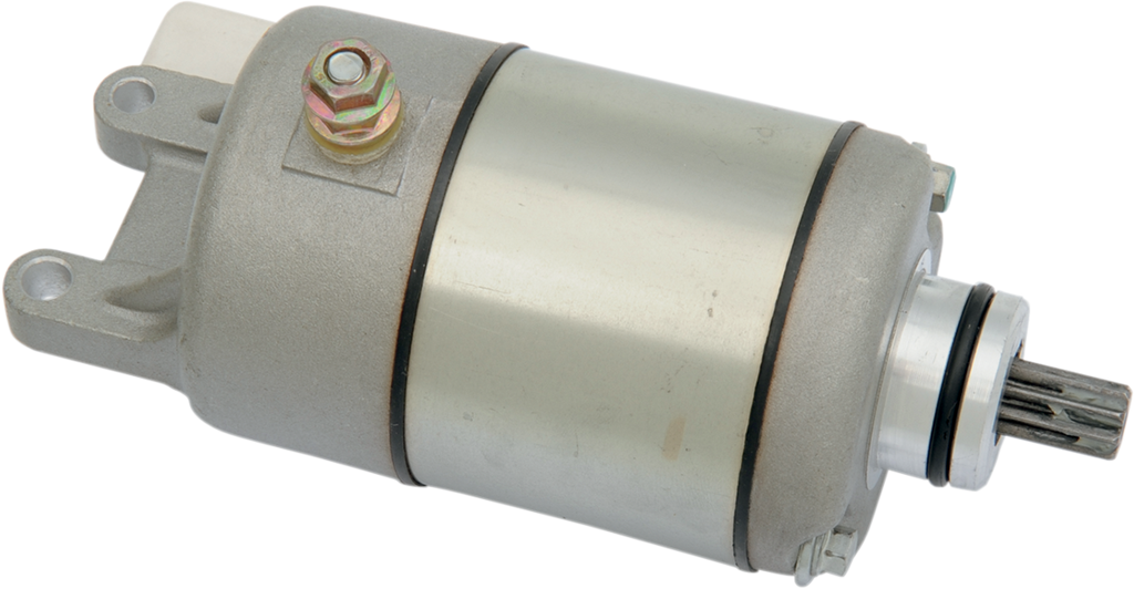 A cylindrical metal starter motor with a silver body, black rings near each end, a protruding gear on one end, and a mounting bracket with a bolt and nut on top, designed for use in automotive or small engine applications.