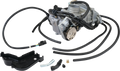 A motorcycle carburetor assembly with various attached black hoses, an electrical connector, and metal fittings. The set includes a black plastic cover, two small metal pipes, a brass nozzle, and a rubber elbow connector, all arranged on a white backgroun