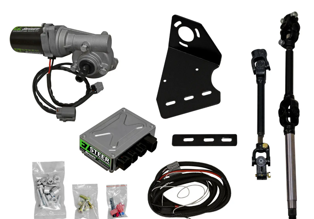 The Polaris Ranger XP 900 Power Steering Kit is displayed on a white background, featuring a motor unit, black mounting bracket, control module, wiring, steering shafts with joints, and hardware packs with bolts, nuts, and connectors.