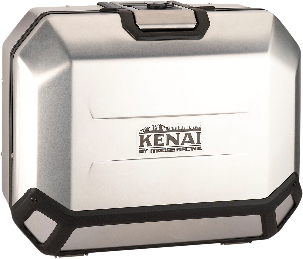 A sturdy, rectangular silver metal case with black reinforced corners and a handle on top. The case features the logo “KENAI BY MOOSE RACING” with a mountain silhouette above the text on its front surface.