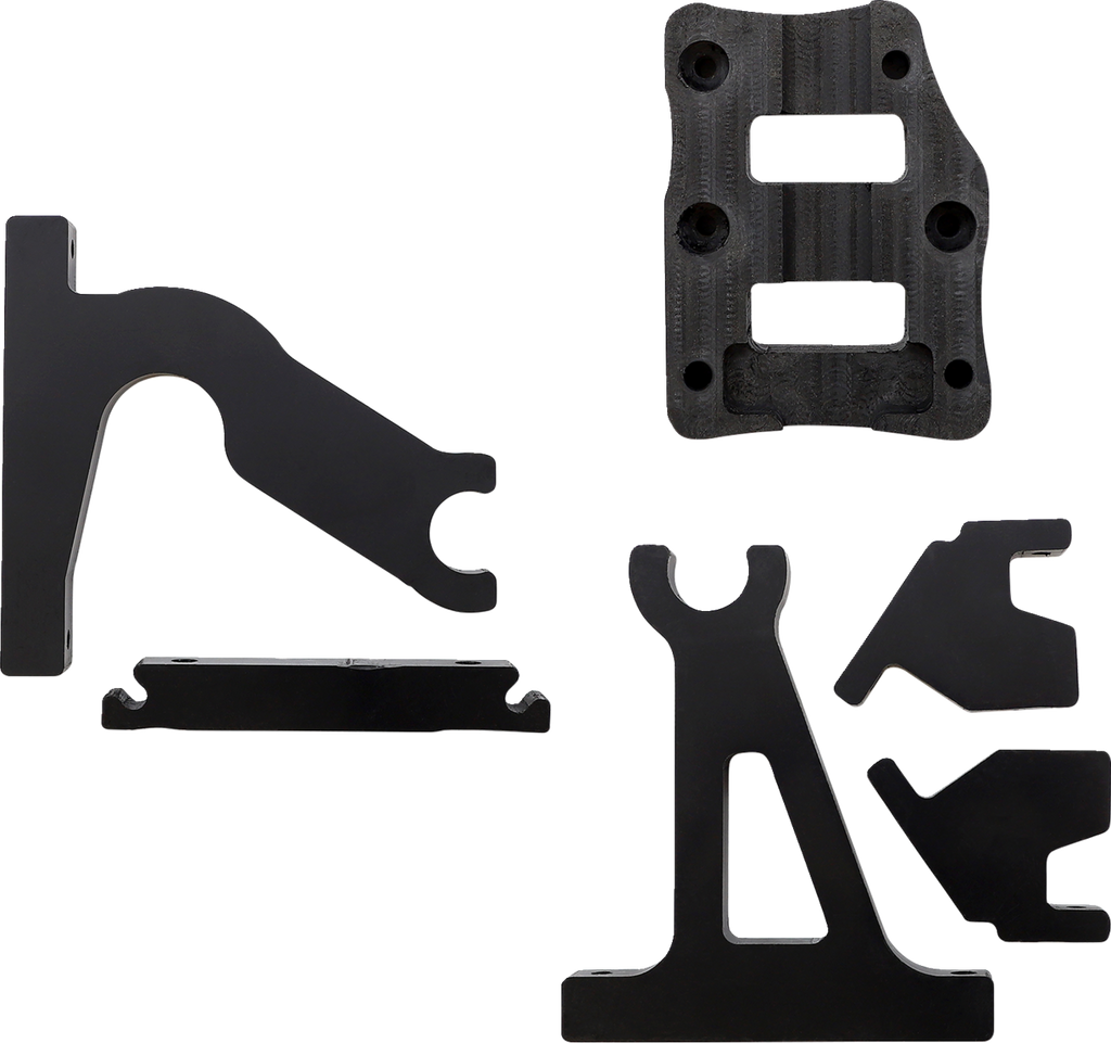 Five black metal or plastic mechanical parts are arranged on a white background. They have various angular shapes and cutouts, including one piece with two rectangular slots and another with a triangular opening and forked end.