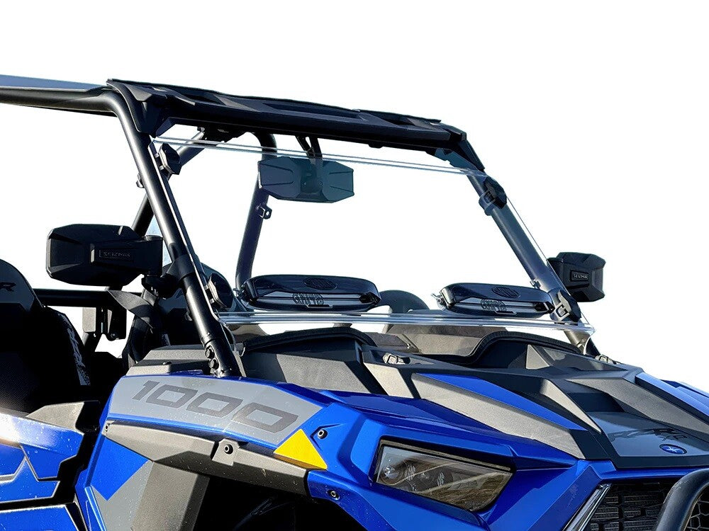 A close-up view of a 2019+ Rzr Xp 1000 with a scratch resistant venting windshield, clear glass, black roll bars, side mirrors, mounted speakers, and 1000 on the hood. The vehicle is blue with a plain white background.