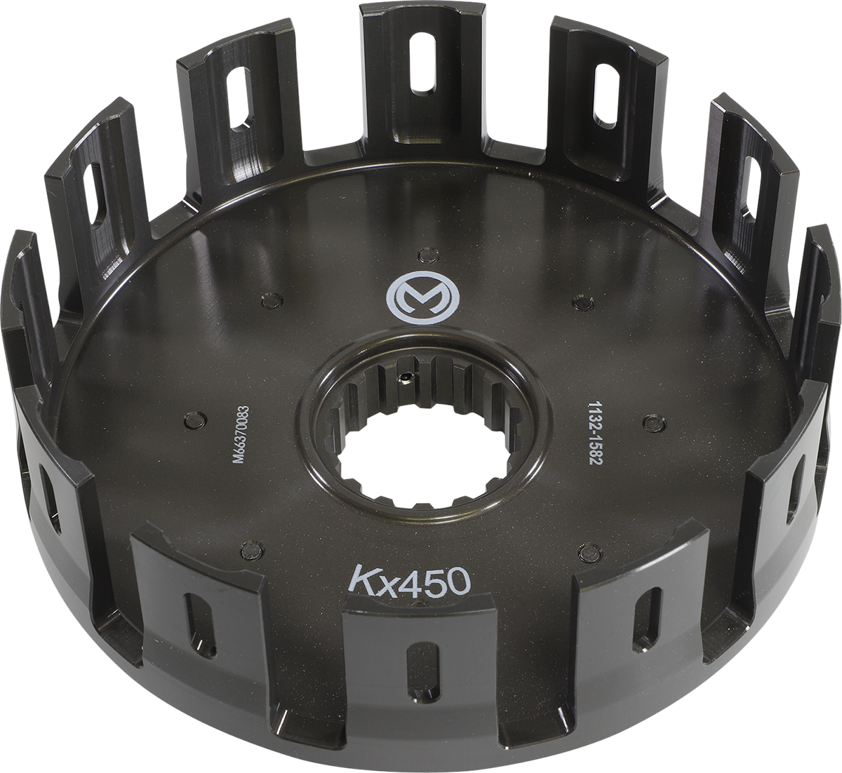 A metallic, circular motorcycle clutch basket labeled KX450 with multiple rectangular slots along the rim. The inner section has a splined center hole and engraved numbers. The part is dark gray with a matte finish, viewed against a white background.