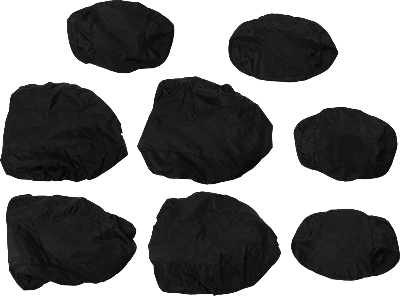 Seven black, crumpled, oval-shaped fabric covers of varying sizes are spread out on a plain white background. The material appears thin and lightweight, with visible folds and gathered edges.