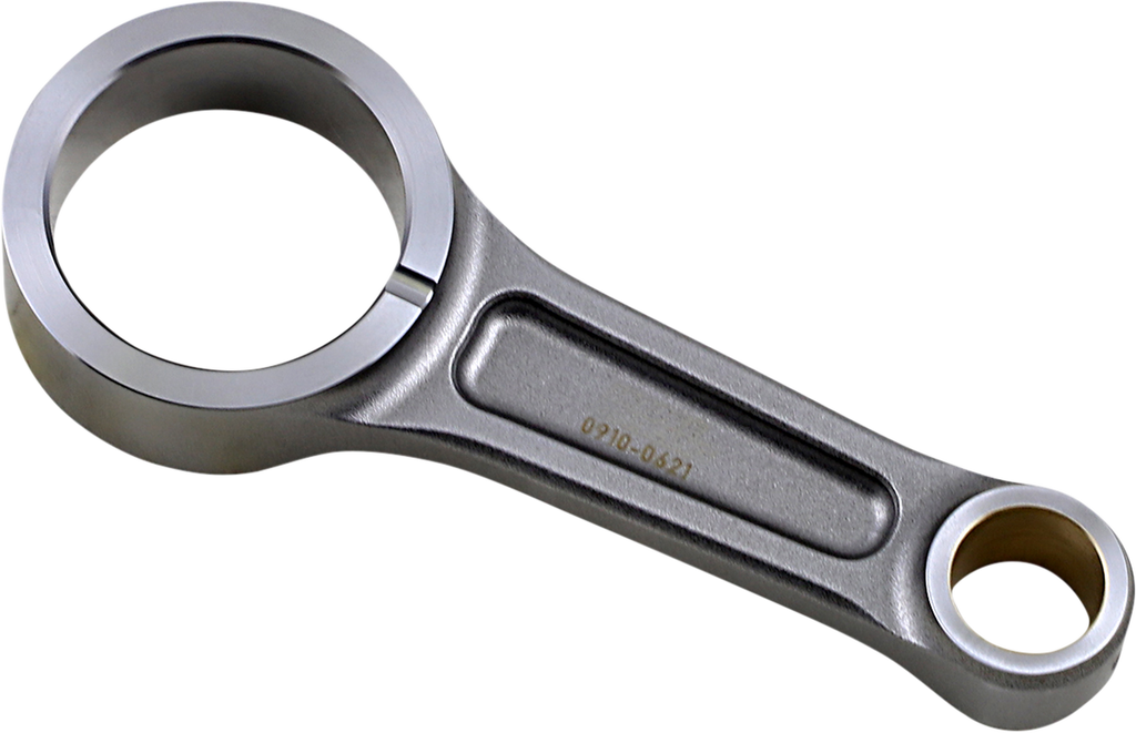 A metallic connecting rod with a matte finish, featuring a large circular opening at one end with a visible seam, a smaller round hole at the other end, and a recessed rectangular center section with engraved numbers. The background is plain and light-col