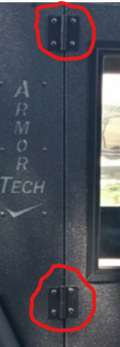 Close-up of a black vehicle door with ARMOR TECH branding, showing two red-encircled Hinge Replacement Armor Tech hinges. A partially visible window with a black frame appears on the right side.