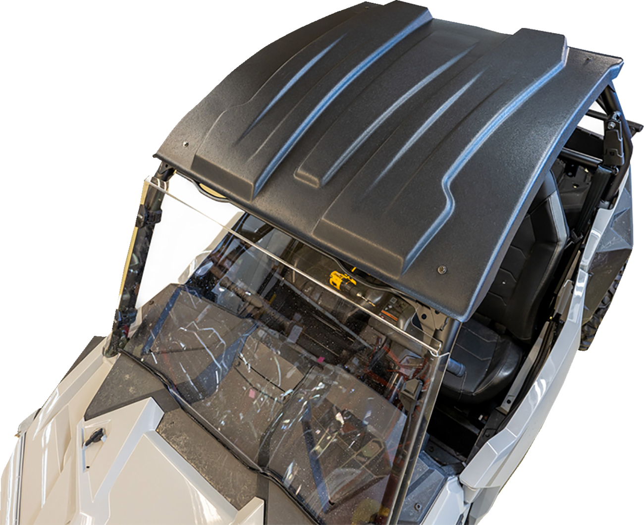 A top-down view of a white off-road vehicle with a black, contoured hard roof and a clear windshield. The interior and steering area are partially visible, showcasing rugged design and seating for two. The background is plain and uncluttered.
