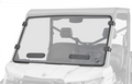 A Can-Am Defender Scratch Resistant Vented Full Windshield with two black adjustable vents and four black clamps is mounted on the front of a white off-road utility vehicle. Interior seats, steering wheel, and headrests are visible through the glass.