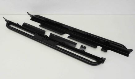 A pair of Mahindra Roxor Rock Sliders by On The Rox, made of black metal with mounting brackets and tubular outer edges, are shown side by side on a light background. They provide protection and a step for vehicle installation.