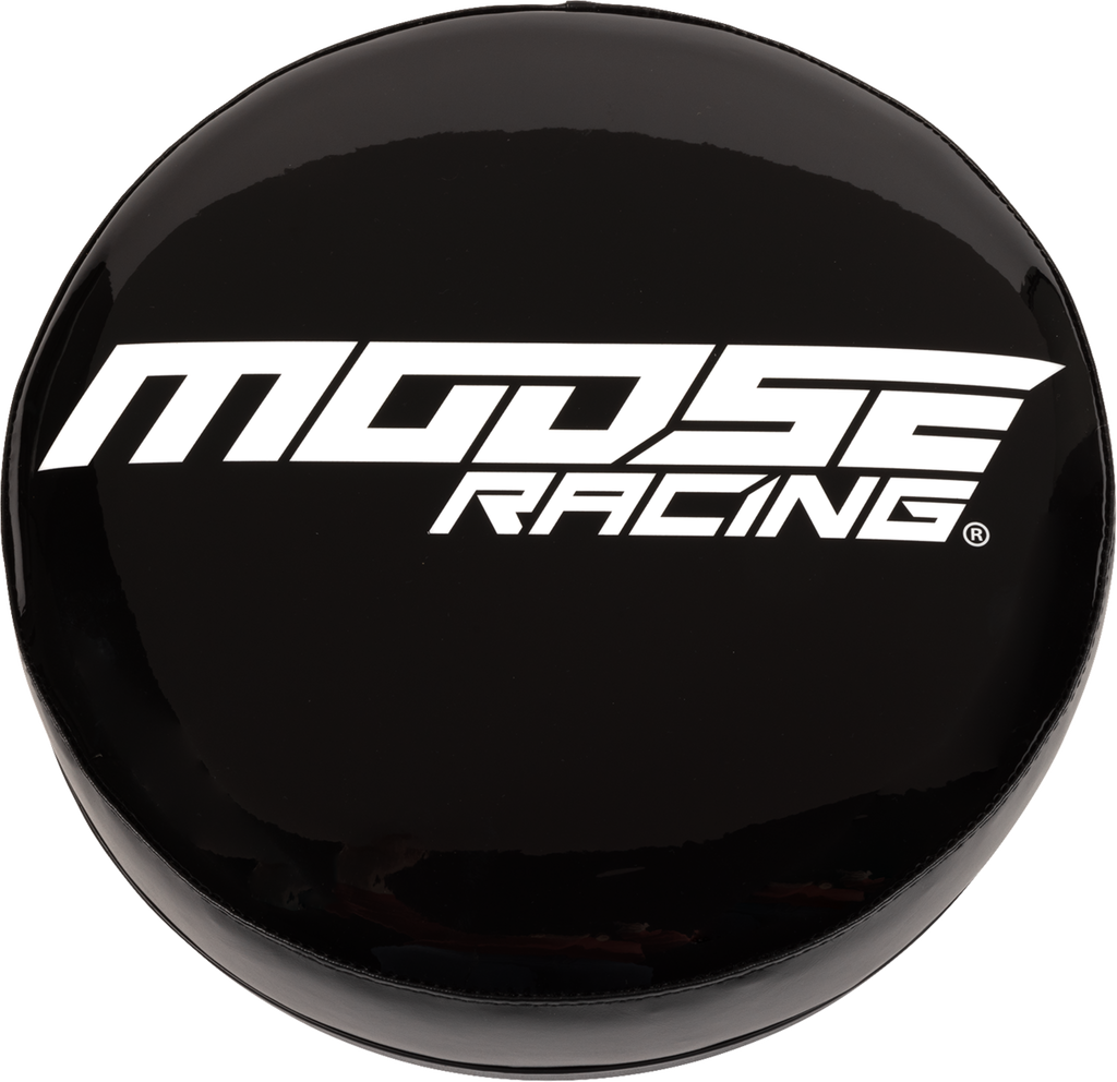 A black round cover with bold white text reading MOOSE RACING in a modern, angular font. The surface is glossy, reflecting light. The background is plain and light-colored, making the cover and text stand out clearly.