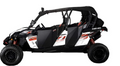 The Can-Am Maverick Max Commander Max with Dirt Specialties half doors features black and white styling, seating for four, rugged tires, red accents, secure half doors, and a partially open roof for all-terrain adventures.