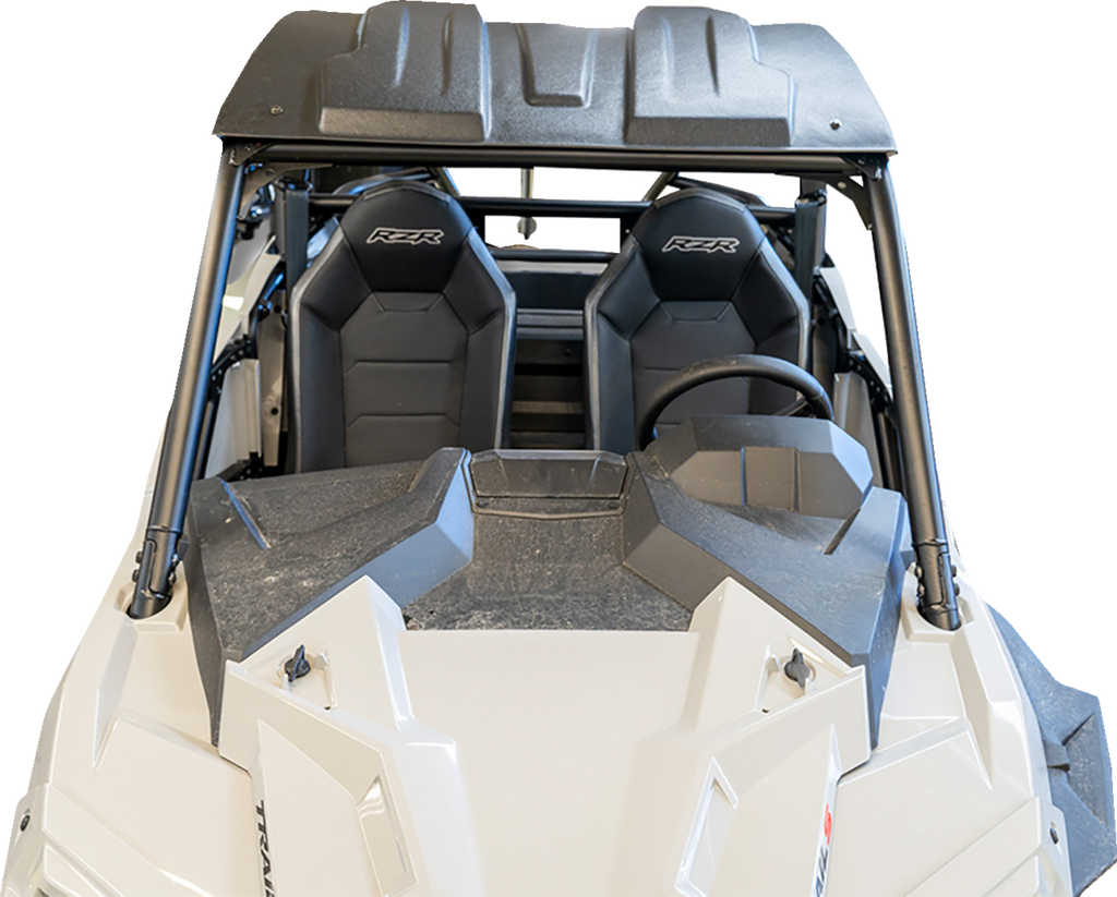 A top-down view of a white off-road vehicle with two black bucket seats labeled RZR, a black roll cage, and a black roof. The dashboard and steering wheel are visible, and the bodywork has angular contours.