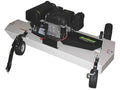 The Finish Cut Mower AcrEase Model C60BE is a gasoline-powered tow-behind mower with a rectangular metal deck, rear large black wheels, front tow bar and small wheels for vehicle attachment, and a black engine on top.