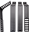 Four black metal wall-mount racks with rectangular perforations are shown. Three racks are upright, displaying their perforated sides, while one is angled to reveal its side and mounting bracket. The background is plain white.