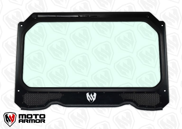The Full Glass Windshield With Vents For 900, 1000, Turbo is a rectangular clear panel with a black metal frame, mesh vents at the bottom, and a white stylized M logo in the center. The MOTO ARMOR logo appears in the lower left corner on a patterned backg