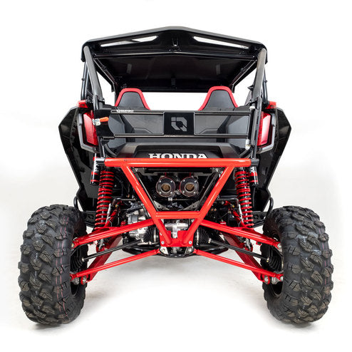 Rear view of a Honda Talon 1000R/X (2019+) with HMF Defender Rear Hitch Bumper, featuring large knobby tires, exposed suspension, dual exhausts, and two bucket seats—all set against a plain white background.