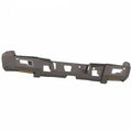 The 2017-2021 Ford F-250 Identity Rear Bumper Full Kit features a rugged raw steel design with angular lines, accent lights, fog light cutouts, multiple mounting holes, and orange reflectors—ideal for off-road trucks.