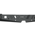 The 2010-2018 Ram 2500 Spartan Rear Bumper by Road Armor features a matte black textured finish, angular contours, geometric lines, cutouts, and reinforced sections for off-road durability.