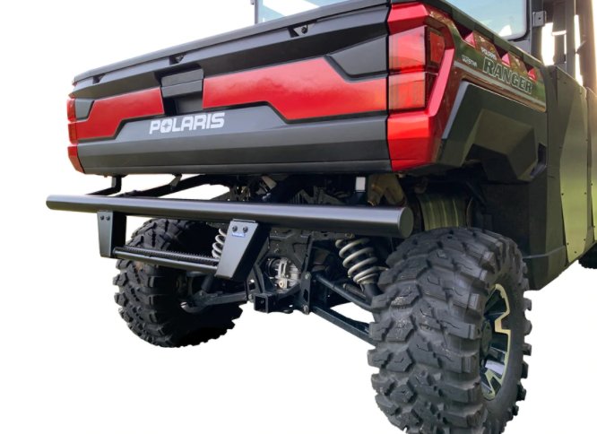 Rear view of a Polaris Ranger 1000/1000 XP/Crew 1000 with Rival rear bumper, large rugged tires, suspension system, and bold POLARIS tailgate lettering. The utility vehicle is displayed on a white background.