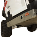 Close-up, low-angle shot of a white Polaris General XP 4 1000 (2020-2022) with red accents, showing a silver 2-Piece Aluminum Rock Slider Skid Plate installed for protection. A rugged black tire appears on the left.