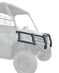 A close-up of the rugged black Kawasaki Mule Pro-Mx / EPS / EPS LE Front Bumper on a green off-road utility vehicle, with only the front in full color and the rest faded to highlight the bumper.