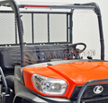 A bright orange RTV X900 features a Quantum Coated Vented Windshield, black grille, clear windshield, mesh rear panel, black bench seats, right-side steering wheel, headlights, and “RTV X900” model label on the side.