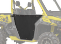 A Can-Am Defender Aluminum Half Door by SuperAtv is shown installed on the drivers side of a yellow off-road utility vehicle with two black seats, highlighted with a faded background for emphasis.