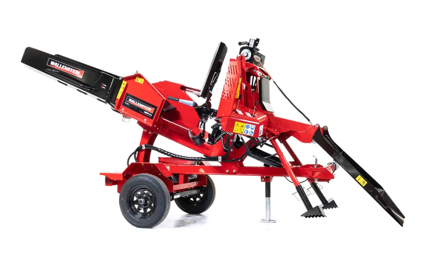 The UTV/ATV Towable Firewood Processor WP525 is a red, wheeled machine with hydraulic controls, black conveyor belt, cutting mechanism, visible metal parts, safety labels, and a support leg, shown in side view on a white background.