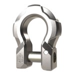 The Shackle Identity Aluminum Shackles - Gunmetal features a matte silver, U-shaped design with geometric grip grooves, a removable cylindrical pin, and a small hexagonal logo embossed on the lower left side.