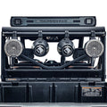 Close-up of a Can Am Defender Wake Tower Speaker Bar Raw mounted on a vehicle roll cage, featuring three Rockford Fosgate speakers and two cylindrical subwoofers. The rugged setup is built for outdoor or off-road adventures.