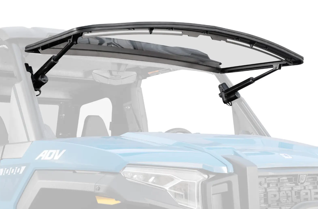 A Polaris Xpedition Maxdrive Power Flip Windshield with a black frame is mounted on the front of a blue off-road utility vehicle, raised by two black metal arms to reveal the vehicle’s interior through the open section.