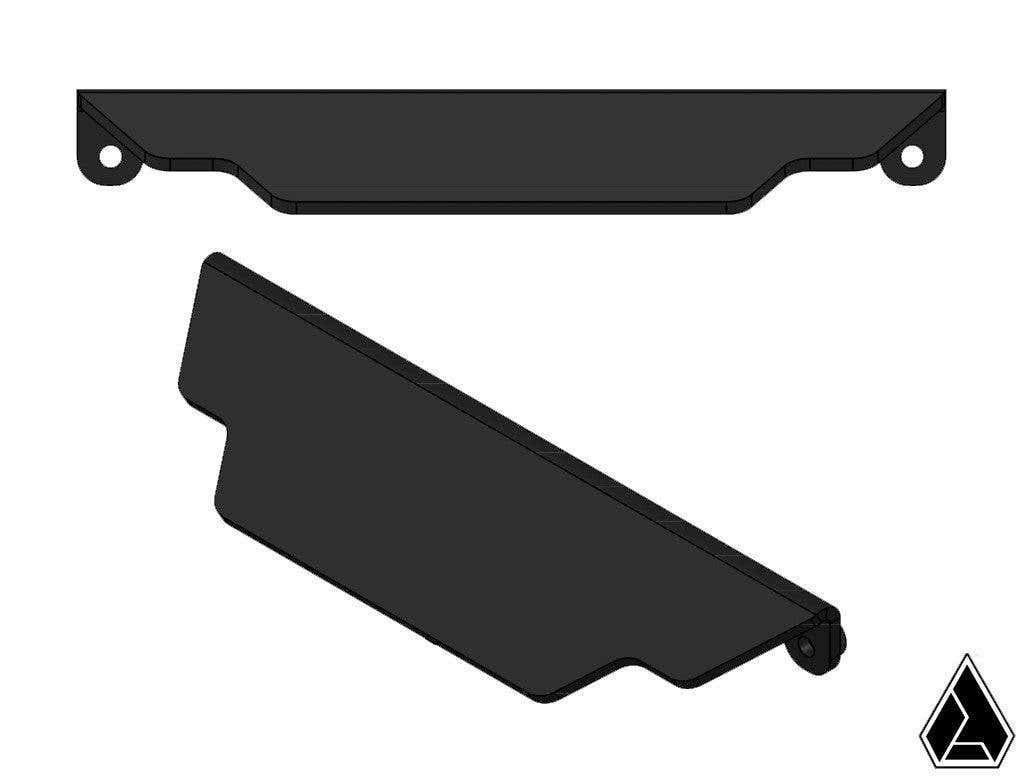 A 3D rendering shows the black, irregularly-shaped Assault Industries Media Console Visor for Polaris Slingshot, featuring two rounded mounting holes. It’s displayed from a top and angled side view, with a geometric triangular logo in the bottom right cor