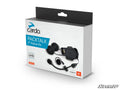 A white retail box labeled Cardo Packtalk Edge 2nd Helmet Kit displays images of helmet audio gear like speakers and a mic. “Original cardo accessory” and “Sound by JBL” are highlighted. The box has a clean look with blue and orange accents.
