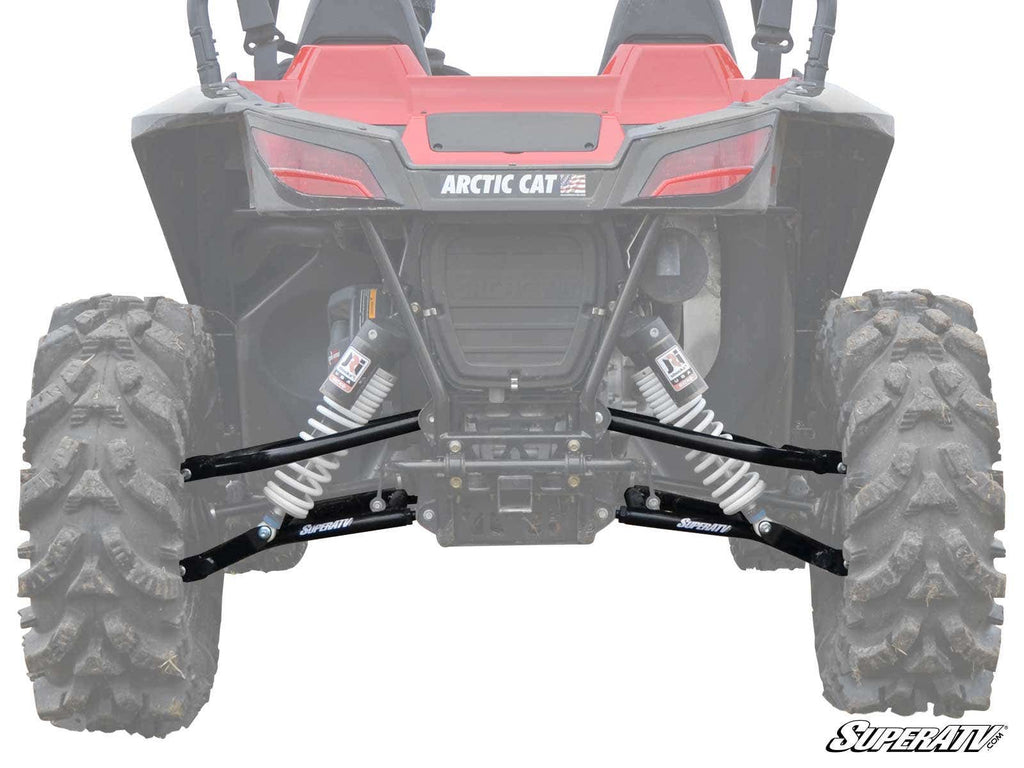 Rear view of a red and black vehicle with ARCTIC CAT in white on the back, featuring large tires, visible suspension springs, and black Arctic Cat Wildcat Sport High Clearance Rear A-Arms.