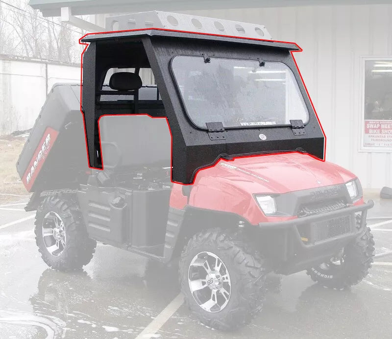 A red utility vehicle with large rugged tires is parked outdoors, featuring the Armor Tech Windshield/Top/Rear Glass Ranger 800—an angular black metal cab enclosure with glass windshield, roof, and windows covering the front seats and dashboard.