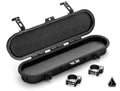 The Assault Industries UTV Belt Case is a black, hard-shell oval case with foam padding, two latches, a textured surface, and a geometric triangular logo in the bottom right corner. Two metal mounting brackets are displayed in front of the open case.
