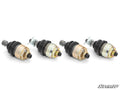 Four Can-Am Defender Keller Ball Joints with black rubber boots and gold-colored hex nuts are arranged in a row on a white background. The “SuperATV” logo appears in the bottom right corner.
