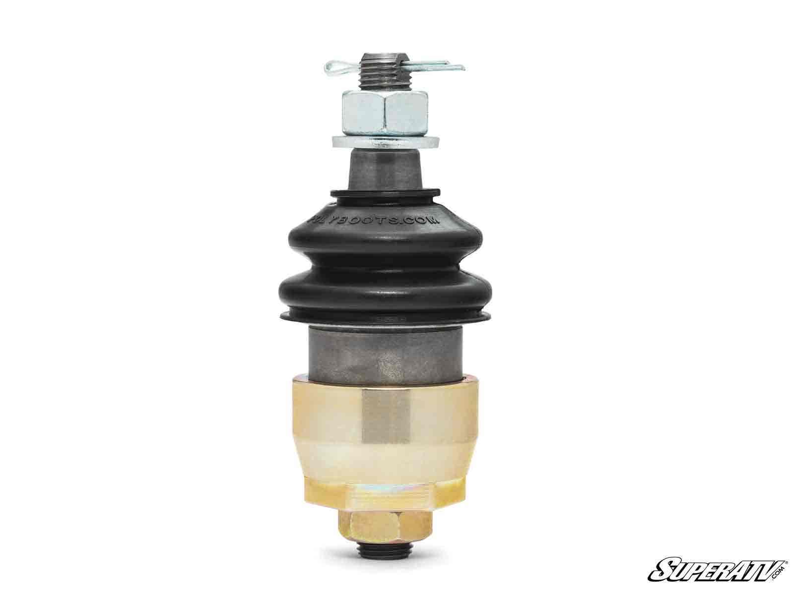 The Honda Pioneer 700 Keller Ball Joint features a heavy-duty build with a central black rubber boot, metal components at the top and bottom, and a golden-brass lower section. The SuperATV logo appears in the bottom right on a white background.