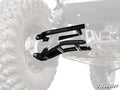 A close-up of heavy-duty black and silver Bobcat UV34 High-Clearance 1.5 Rear Offset A-Arms installed on an off-road vehicle, with the surrounding tire and frame partially visible against a fading white background.