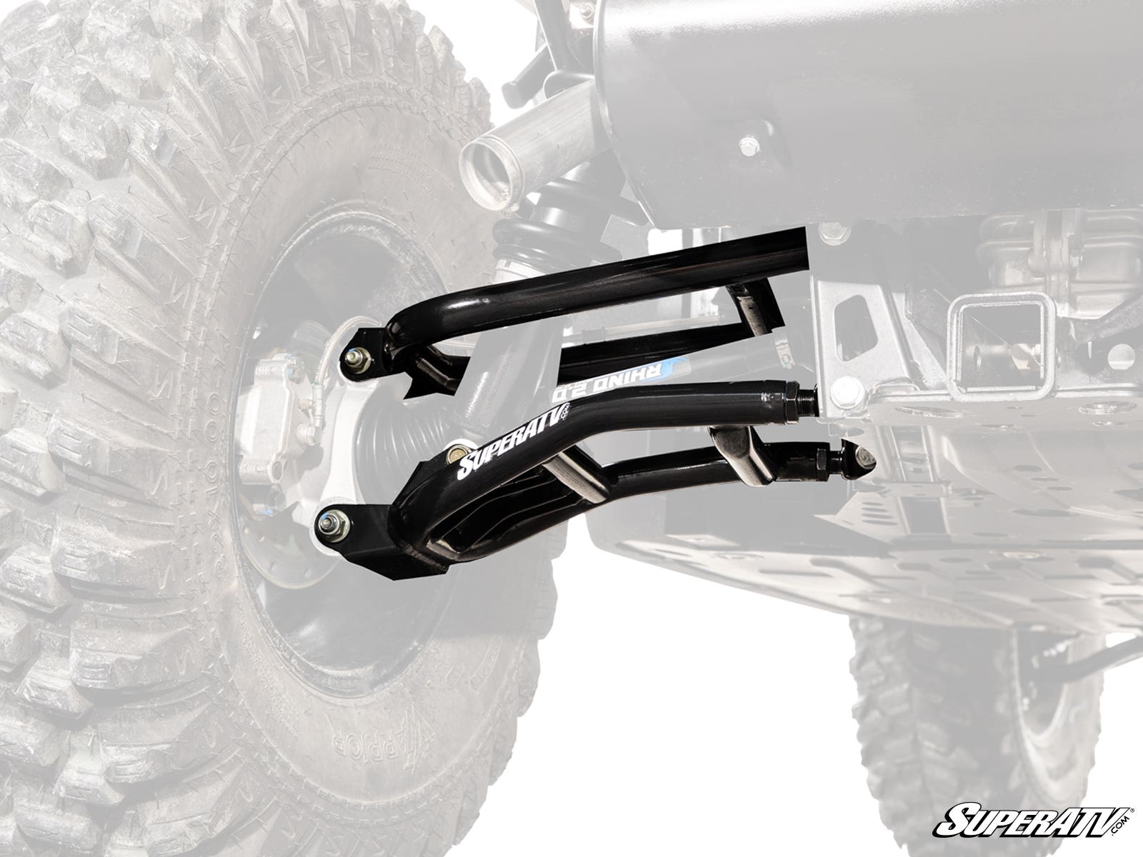A close-up of heavy-duty black and silver Bobcat UV34 High-Clearance 1.5 Rear Offset A-Arms installed on an off-road vehicle, with the surrounding tire and frame partially visible against a fading white background.