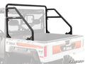 A Bobcat UV34 Rear Sport Accessory Bar is installed in the cargo bed of a white Bobcat 4x4 utility vehicle. The black metal bar with angled supports surrounds the rear cab window, with visible Bobcat and SuperATV logos.