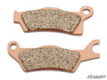 Two Can-Am Renegade Sintered Brake Pads, tan and metallic with textured friction surfaces, are shown on a white background. Each pad has an eyelet for attachment and the SuperATV logo is in the bottom right corner.