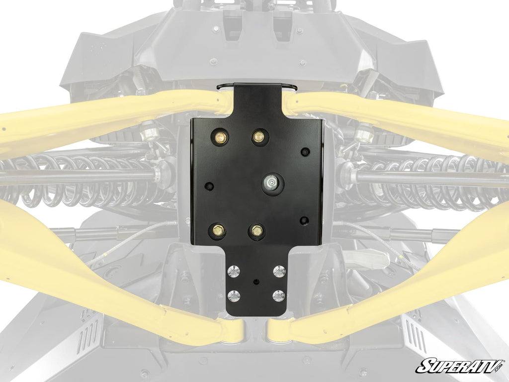 Close-up of a black Can-Am Maverick R Frame Stiffener installed under an off-road vehicle. Yellow suspension arms, springs, and bolts are visible. The background is faded, with the SuperATV logo in the bottom right corner.