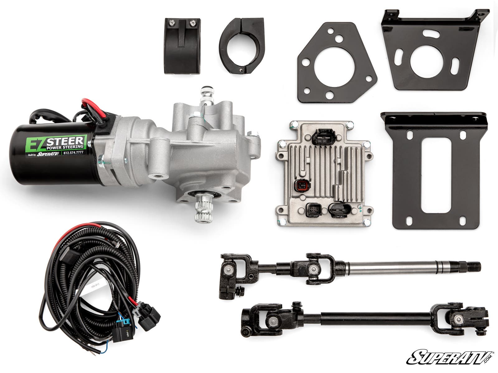 The Can-Am Maverick X3 Power Steering Kit is displayed on a white background, showing a silver electric power steering motor, wiring harness, couplers, brackets, metal shaft, black control box, connectors, and a SuperATV logo in the bottom right.