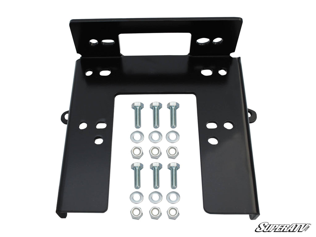 The Can-Am Commander 800 / 1000 Winch Mounting Plate is a black metal bracket with multiple holes and cutouts, shown flat with six bolts, washers, and nuts in two neat rows. The SuperATV logo is visible in the bottom right corner.