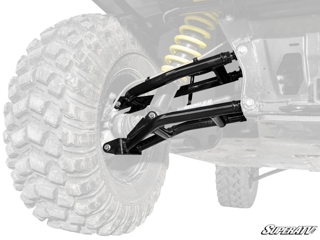 Close-up of Can-Am Defender HD10 2 Rear Offset A-Arms rear suspension with large knobby tire, black metal control arms, and bright yellow coil spring. Most of the vehicle is grayed out to highlight the A-Arms. SuperATV logo shown in lower right.