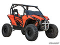 A Can-Am Maverick with a 6 Lift Kit features bright orange paint, large rugged tires, black and orange suspension springs, a front bumper guard, two-seat open cabin, and bold black graphics. SuperATV logo shown in the bottom right corner.