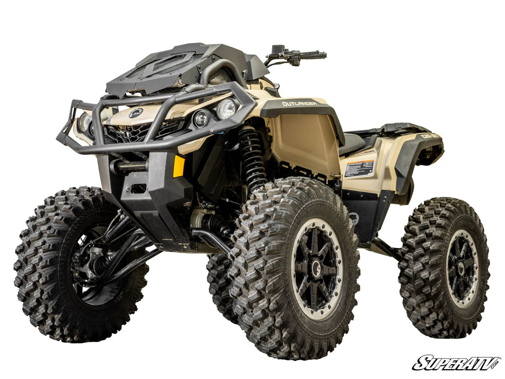 A tan and black Can-Am Outlander ATV with large off-road tires, elevated suspension from a 5 Lift Kit, front bumper guard, and detailed bodywork. OUTLANDER appears on the side; SuperATV logo is in the lower right corner.
