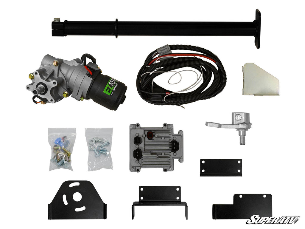 The Can-Am Renegade (Gen 1) Power Steering Kit is shown on a white background with an electric motor, wiring harness, metal brackets and plates, gear assembly, hardware bags, and the SuperATV logo in the bottom right corner.